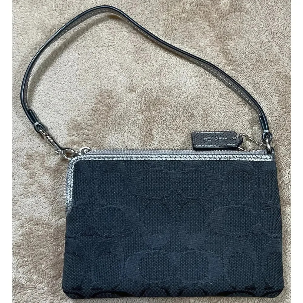 Coach black signature